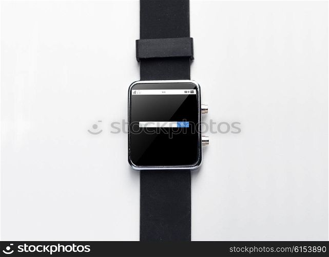 modern technology, object and media concept - close up of black smart watch with internet browser search bar on screen