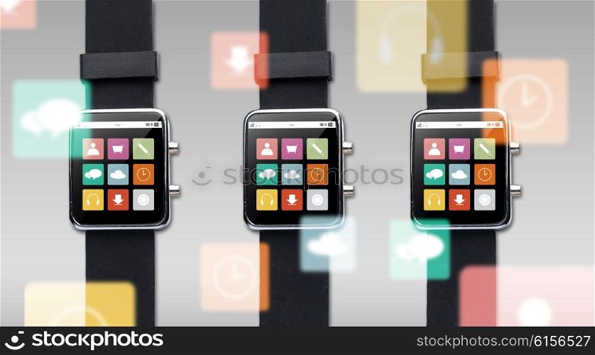 modern technology, object and media concept - close up of black smart watch with menu icons on screen