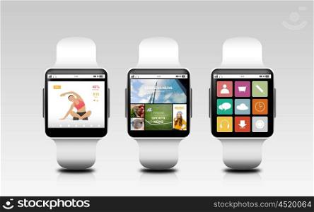 modern technology, object and media concept - smart watches with applications on screen over gray background