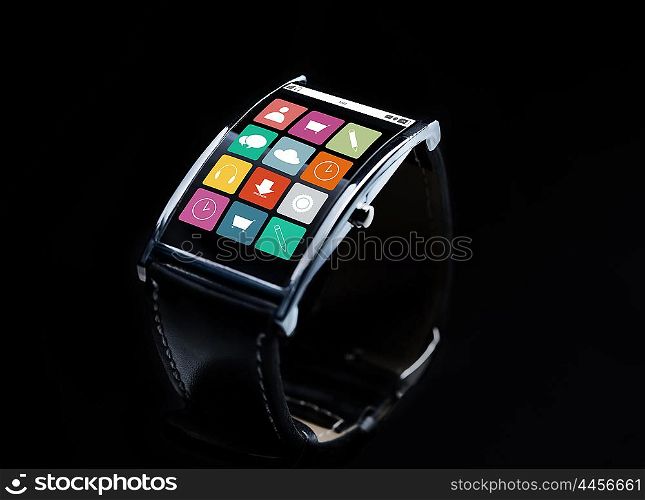 modern technology, object and multimedia concept - close up of black smart watch with menu icons on screen