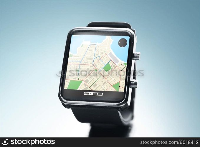 modern technology, object, application and navigation concept - close up of black smart watch with gps and road map on screen over blue background