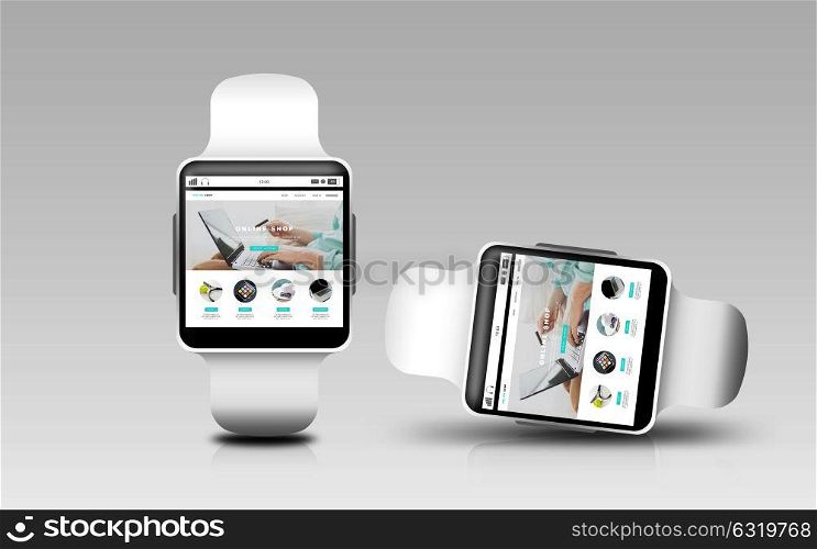 modern technology, object, responsive design and shopping online concept - smart watches with internet shop web page screen over gray background. smart watches with online shop on screen