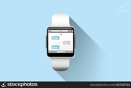 modern technology, online communication, object and media concept - close up of black smart watch with messenger application on screen over blue background. close up of smart watch with messenger application