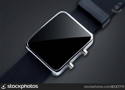 modern technology, time, object and media concept - close up of black smart watch with black blank screen