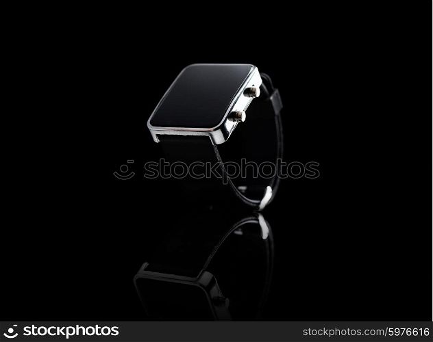 modern technology, time, object and media concept - close up of black smart watch