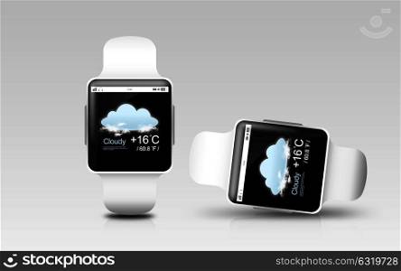 modern technology, weather cast, object, responsive design and media concept - smart watches with meteo forecast on screen over gray background. smart watches with weather forecast on screen