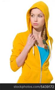 Modern teenager girl in sweater with draped hood looking on copy space