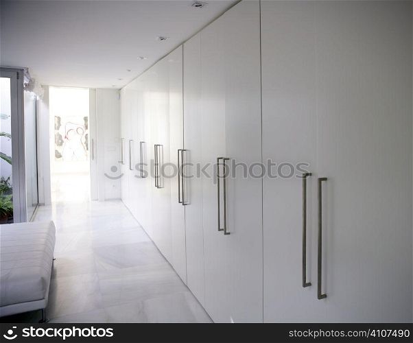 modern white long marble flooring corridor closet, contemporary wardrobe