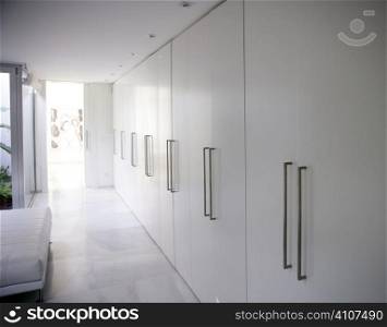 modern white long marble flooring corridor closet, contemporary wardrobe