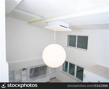 Modern white round chandelier at luxury living room