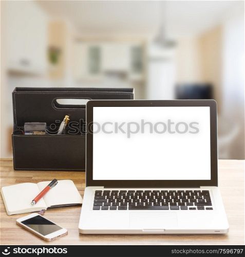 Modern working place with computer and notebook in apartment. Modern working place