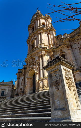 Modica (Sicily): Famous eighteenth-century cathedral with a neoclassical dome that rises above a multi-tiered baroque facade.