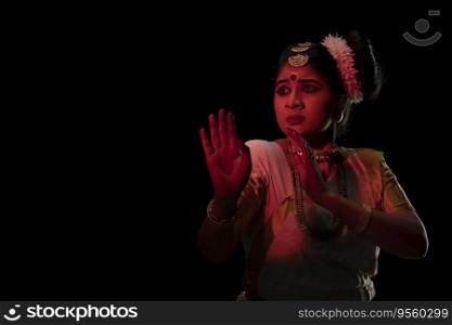 Mohiniattam dancer signifying fear through her dance performance