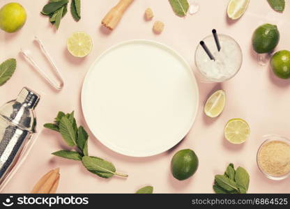 Mojito cocktail ingredients on pink background