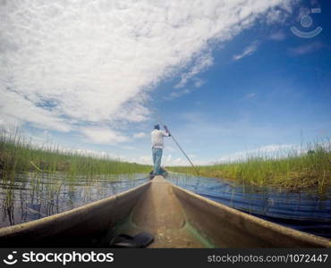 Mokoro canoe trip on the Okavango delta, Botswana.