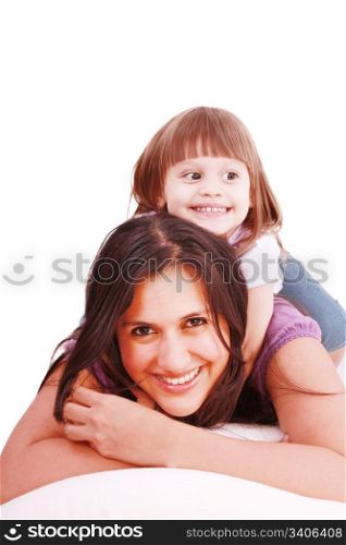 mom and her little girl playing on pillow