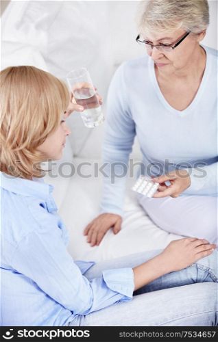 Mom gives daughter pills