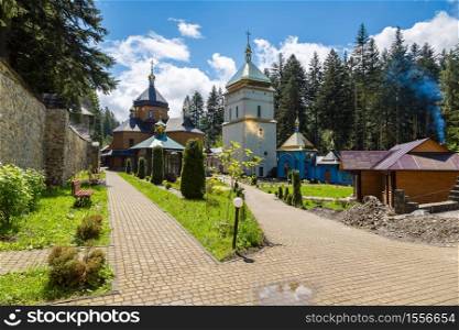 Monastery in Manyava village, Ivano-Frankivsk Region in a beautiful summer day, Ukraine