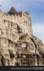 Monastery on cliff in Meteora, Thessaly Greece. Greek destinations. Monastery in Meteora, Greece