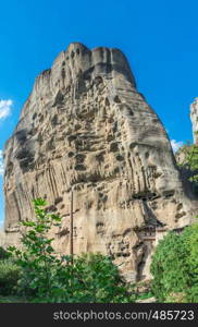 Monastic cave hermit monks houses and rock formation in Meteora near Trikala, Greece.. Rock formation in Meteora, Greece