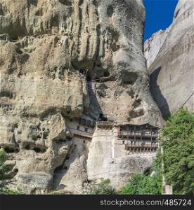 Monastic cave hermit monks houses and rock formation in Meteora near Trikala, Greece.. Rock formation in Meteora, Greece
