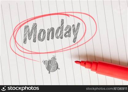Monday note with a red marker on notepaper