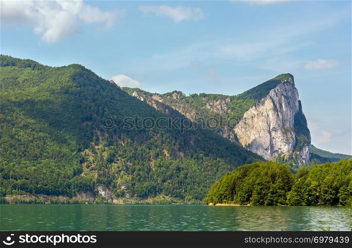 Mondsee summer lake view with rocky shore, Austria.