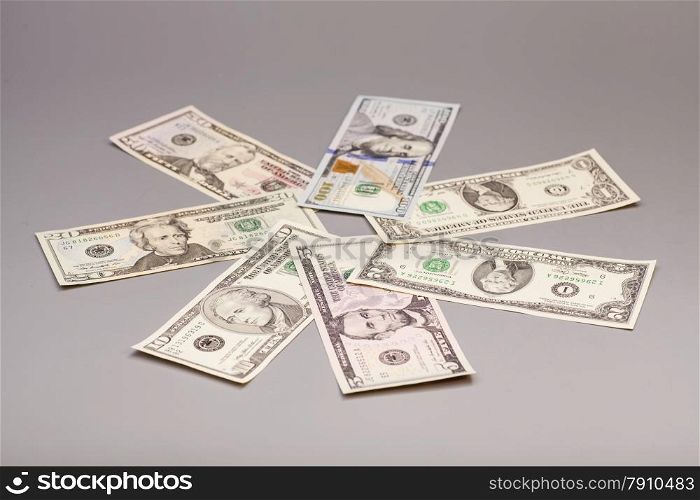 Money American dollar bills isolated on gray
