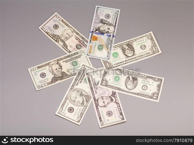Money American dollar bills isolated on gray
