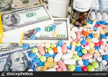 Money and pills. Pills of different colors on money. medicine concept