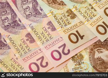 Money and savings concept. Polish zloty banknotes currency as background