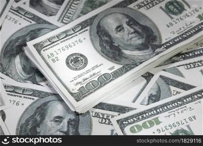 Money background. Closeup of US dollar banknotes. Hundred dollar bills. American currency