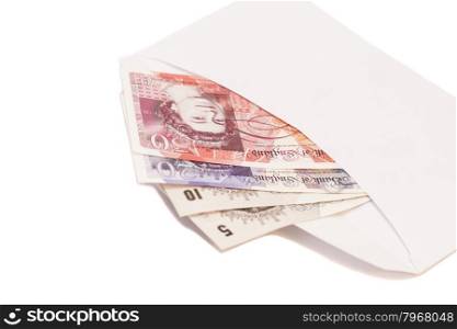 Money British pounds sterling gbp in envelope isolated on white
