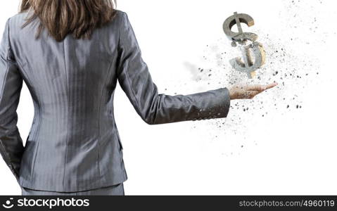 Money concept. Back view of businesswoman holding money symbol in palm