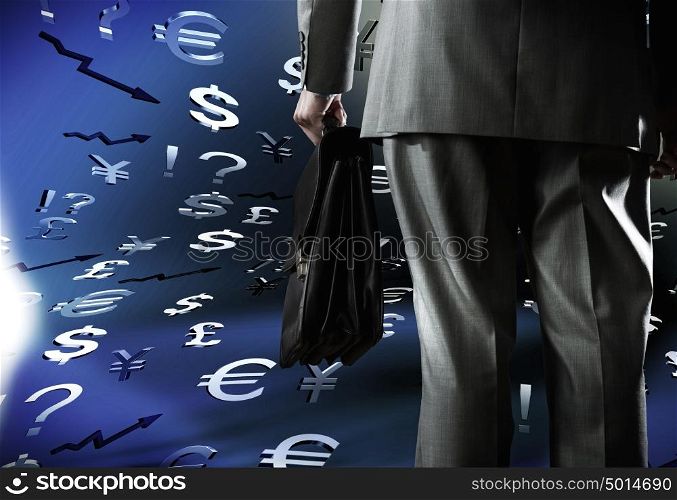 Money concept. Bottom view of businessman with suitcase in hand