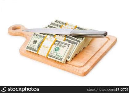 Money concept - cutting dollars with the knife