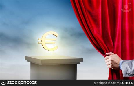 Money concept. Hand of businessman opening red velvet curtain