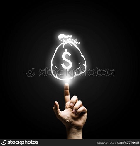 Money concept. Human hand pointing with finger at money sign