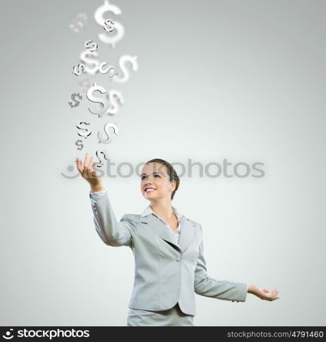 Money concept. Image of young happy businesswoman. Currency concept