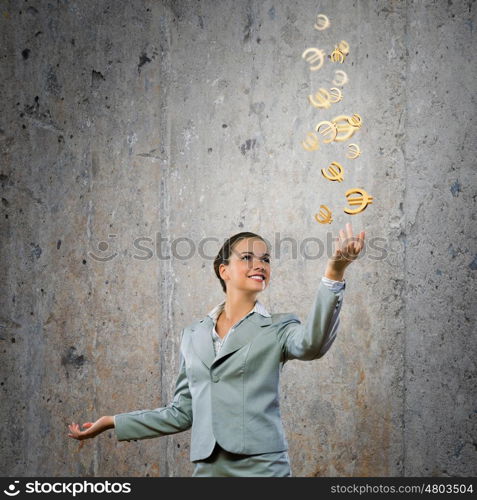 Money concept. Image of young happy businesswoman. Currency concept