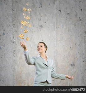 Money concept. Image of young happy businesswoman. Currency concept