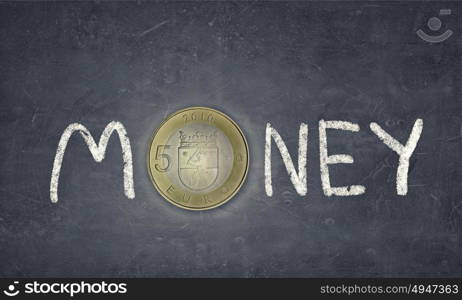 Money concept. Word money with fife euro coin instead of letter O