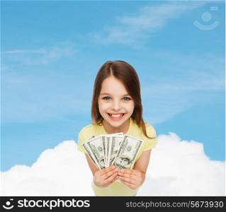 money, finances and people concept - smiling little girl with dollar cash money