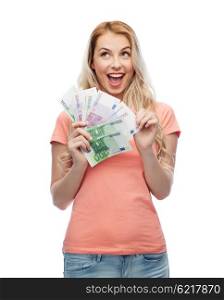 money, finances, investment, saving and people concept - happy young woman with euro cash money
