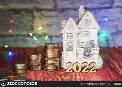 Money for the holiday. A new house as a gift. Holiday New Year and Christmas 2022.. A new house as a gift. Money for the holiday. Holiday New Year and Christmas 2022.