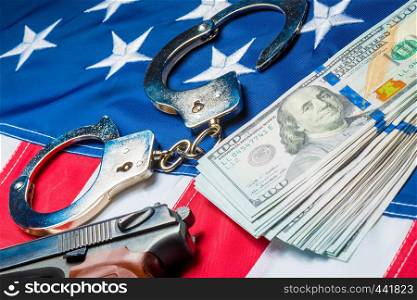 Money laundering concept photo crime and punishment, dollars and american flag