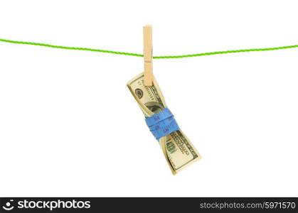Money laundering concept with dollars on the rope