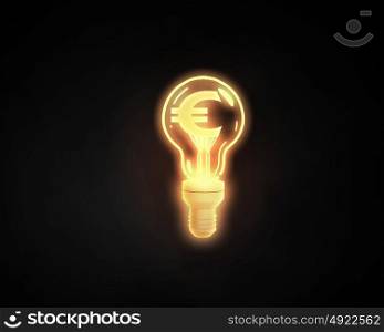 Money making idea. Light bulb with euro sign inside on dark background