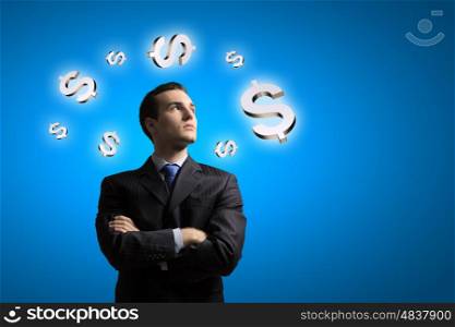 Money making. Image of confident businessman with arms crossed on chest