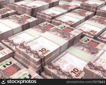 Money of Brazil. Brazilian real bills. BRL banknotes. 10 reals. Business, finance, news background.. Brazilian banknotes. Brazilianreal bills. 10 BRL reals. Business, finance background.